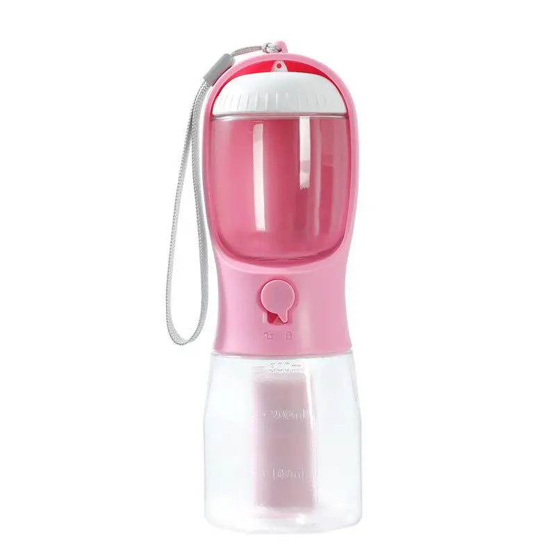 Portable 3-in-1 dog cup in pink for pet hydration, feeding, and waste disposal.