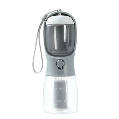 Portable 3-in-1 Dog Cup combining water, food container, and waste bag compartment for pet convenience.