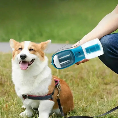 Portable 3-in-1 Dog Cup for Pets with water, food, and waste disposal, perfect for travel.