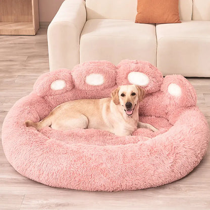 Cozy pink sofa bed for dogs with a plush paw design, perfect for small to medium breeds.